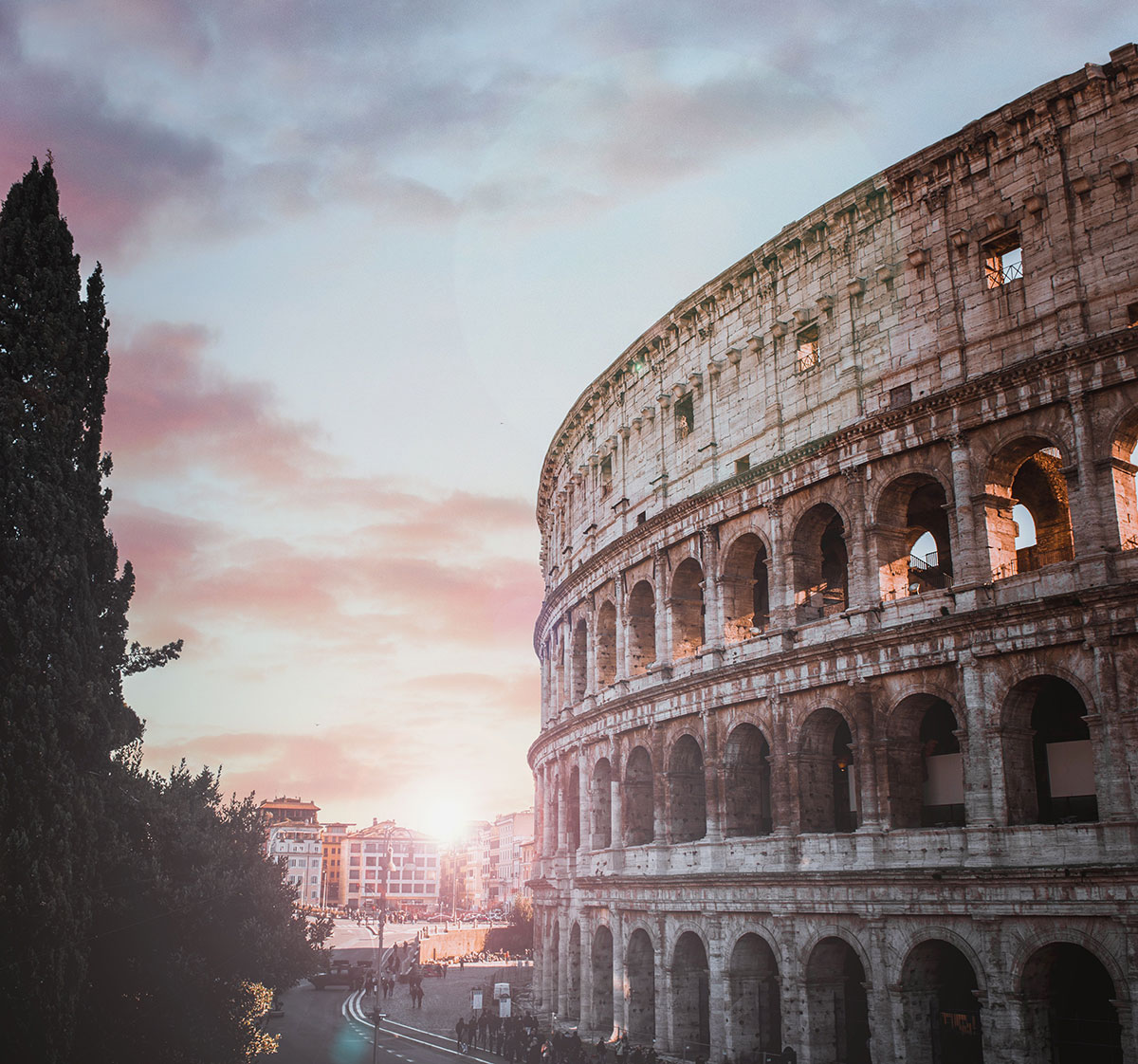 Sunrise over the Colosseum in Rome, Italy.